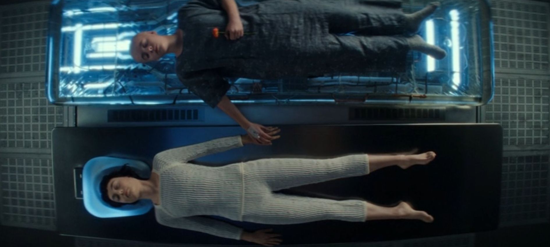 Marcy and Wendy's bodies lie next to each other.