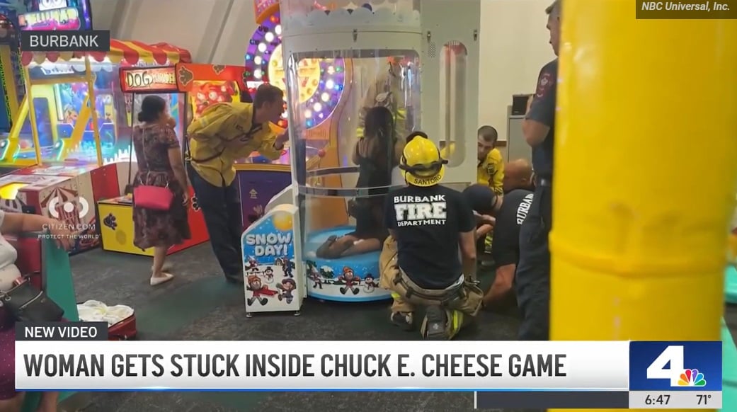 A woman at Chuck E Cheese gets stuck.