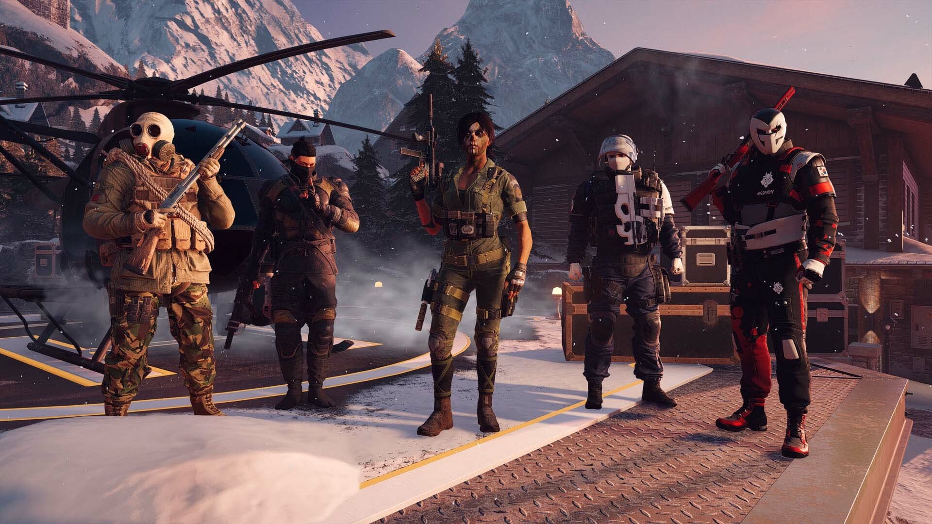 R6 Operators stand in a line up outside of a helicopter.
