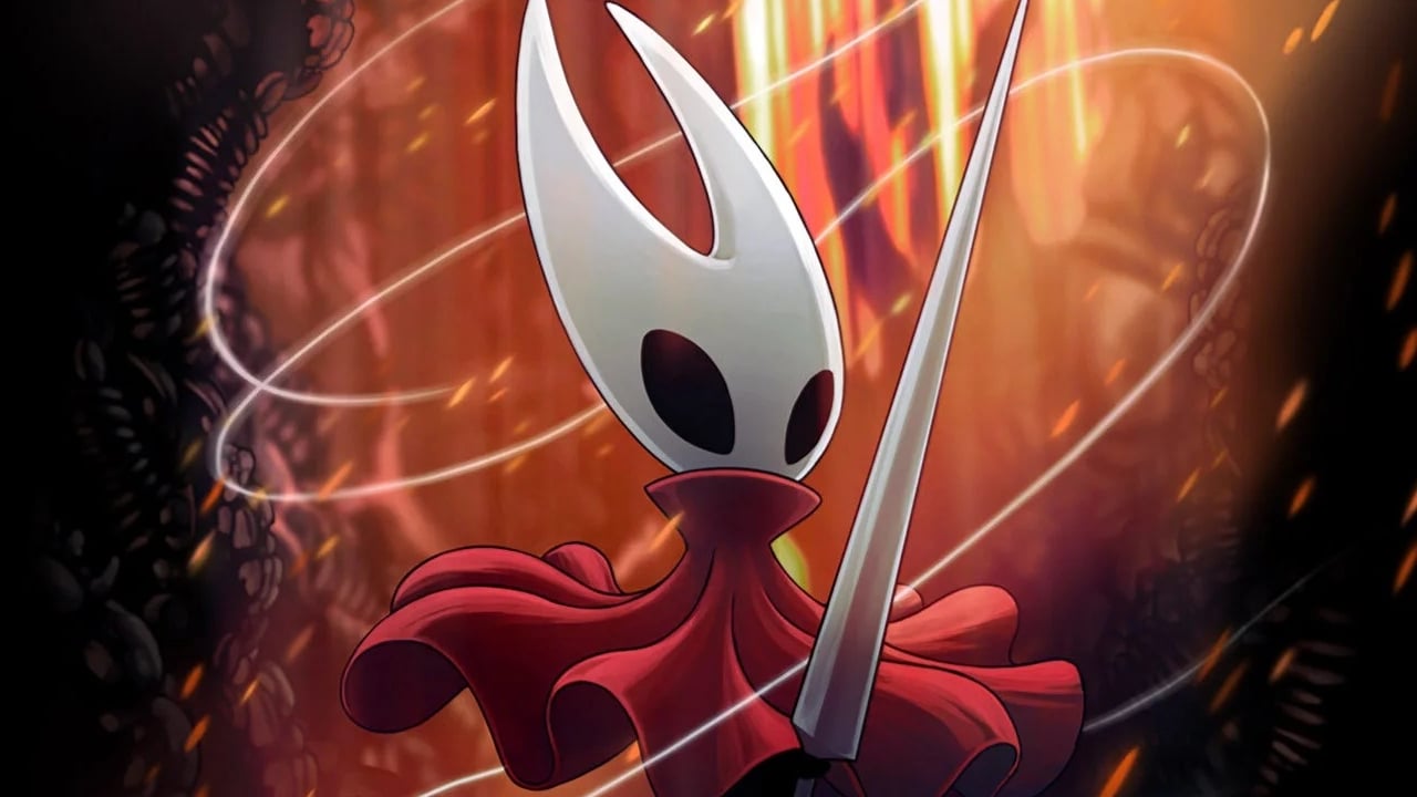 The main character of Silksong holds a sword against a red/orange background.